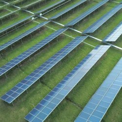 Aerial Orbital View Of Solar Panels Farm Solar Cell Station Production Of Clean Energy SBI  Scaled