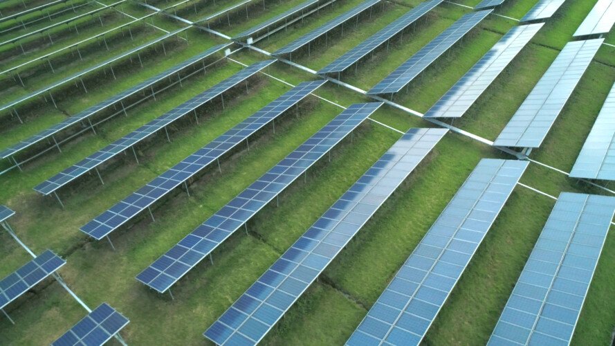 Aerial Orbital View Of Solar Panels Farm Solar Cell Station Production Of Clean Energy SBI  Scaled